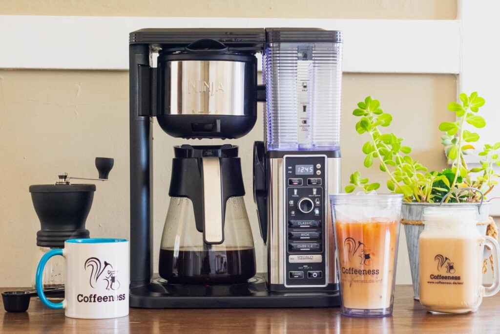 The Ninja Specialty Coffee Maker surrounded by drinks.
