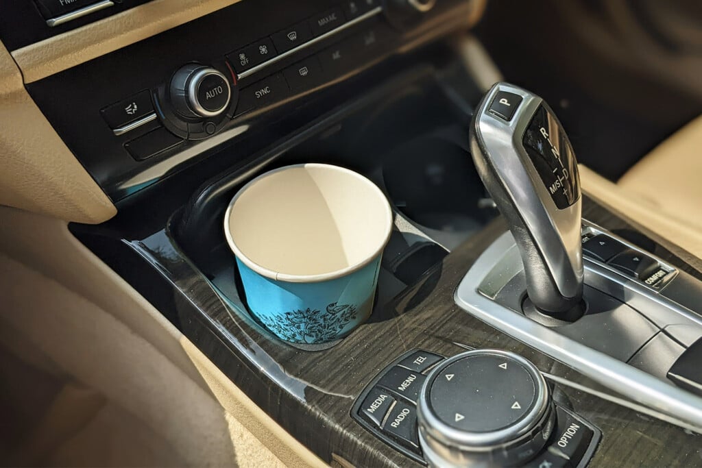 A single-use plastic cup for coffee.