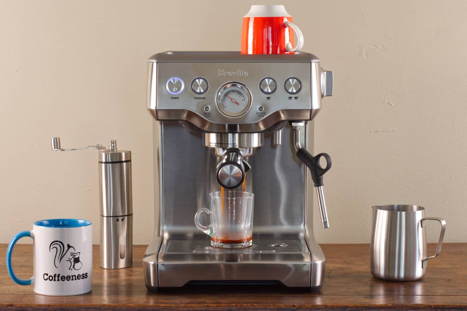 https://www.coffeeness.de/wp-content/uploads/2022/10/breville-infuser-pulling-espresso-shot.jpg