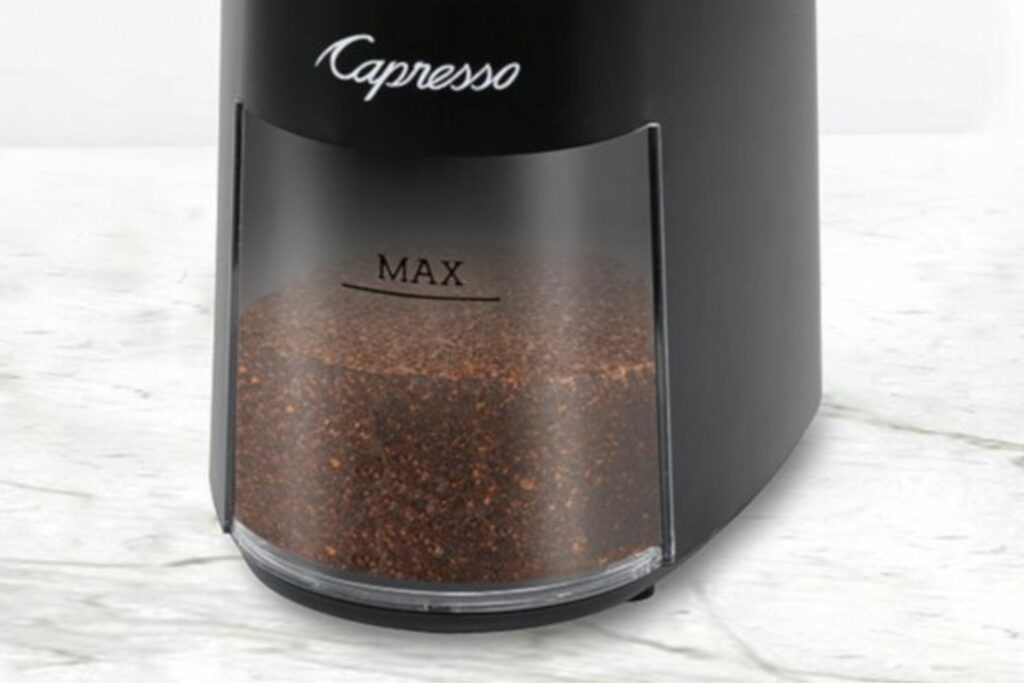 Closeup of the Capresso Infinity Plus grounds container.