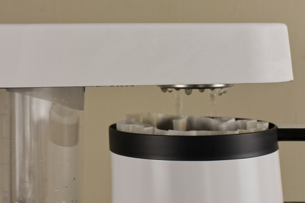 Closeup of the Ratio 6 Coffee Maker shower head in action.