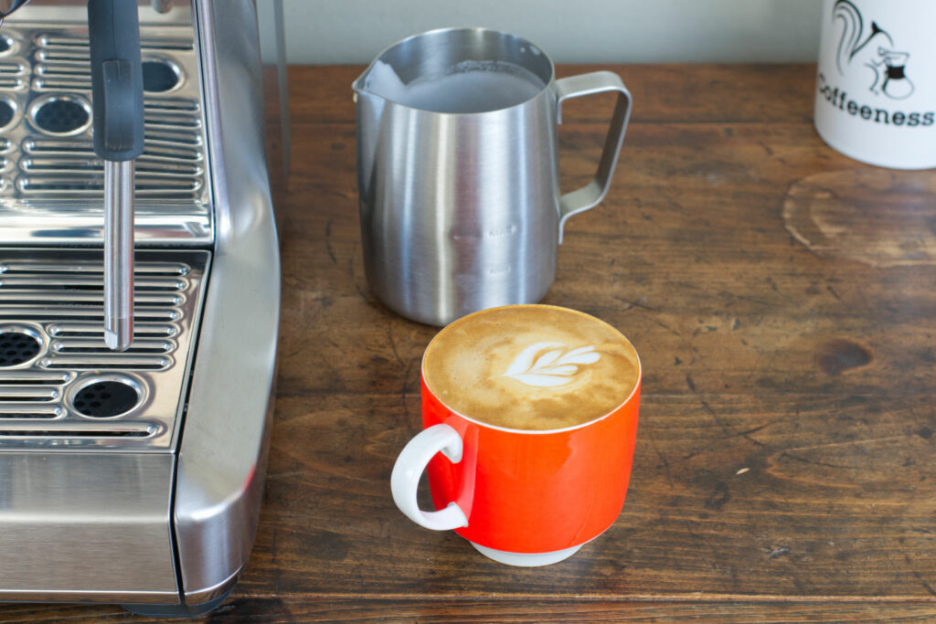 Latte art from the Breville Barista Barista Express Impress.