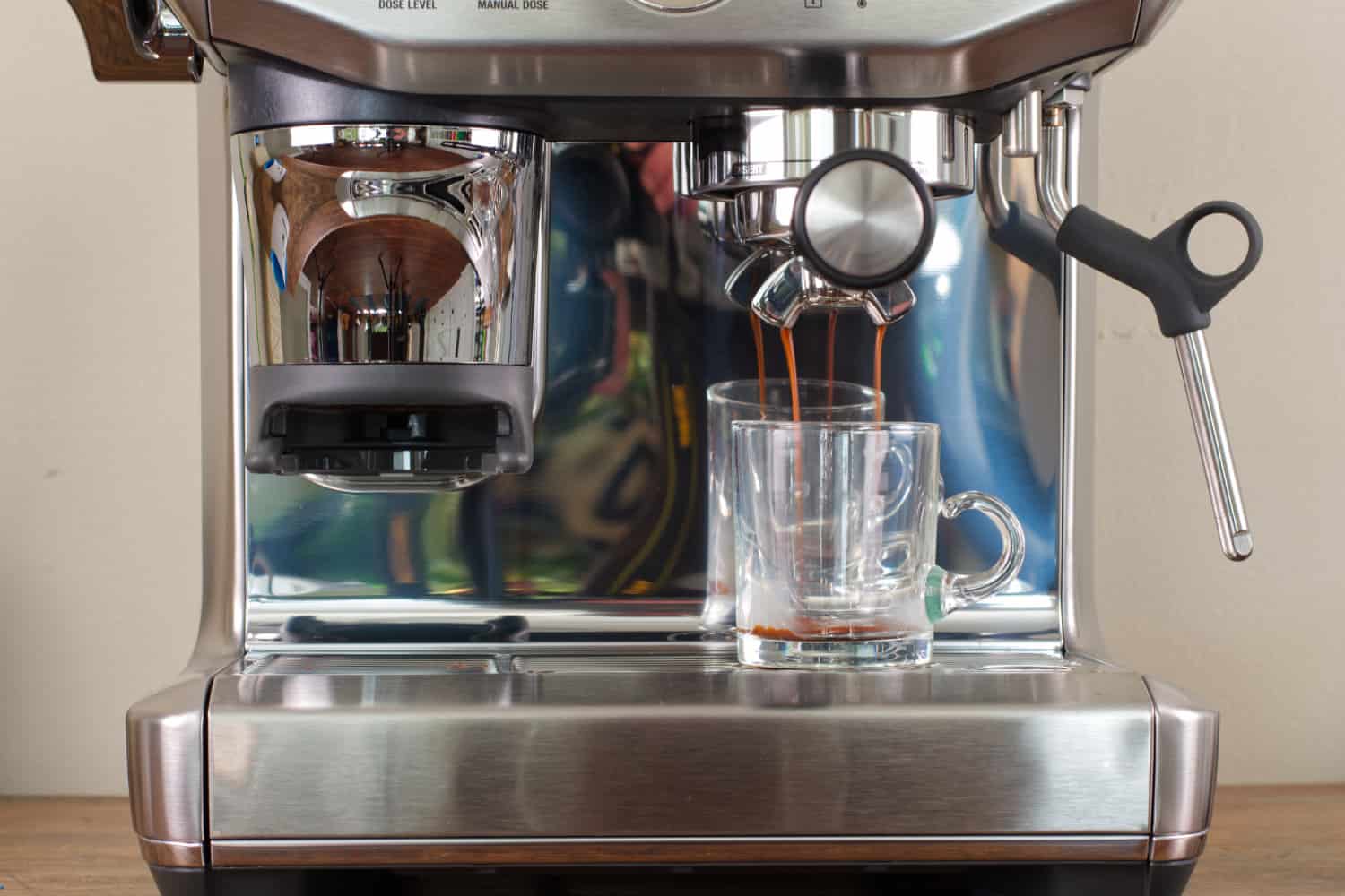 Breville Barista Express Impress Review: An Espresso Machine With Training  Wheels