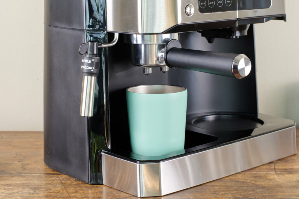 Brewing into a travel mug with the DeLonghi All in One.