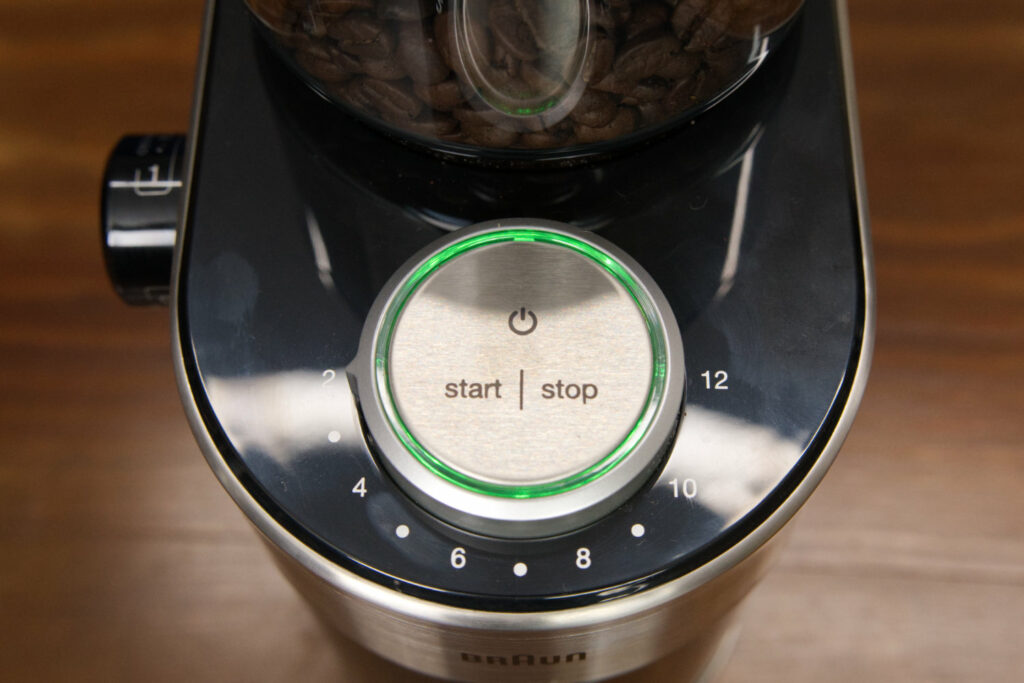 Braun Kaffeemuehle an aus Button