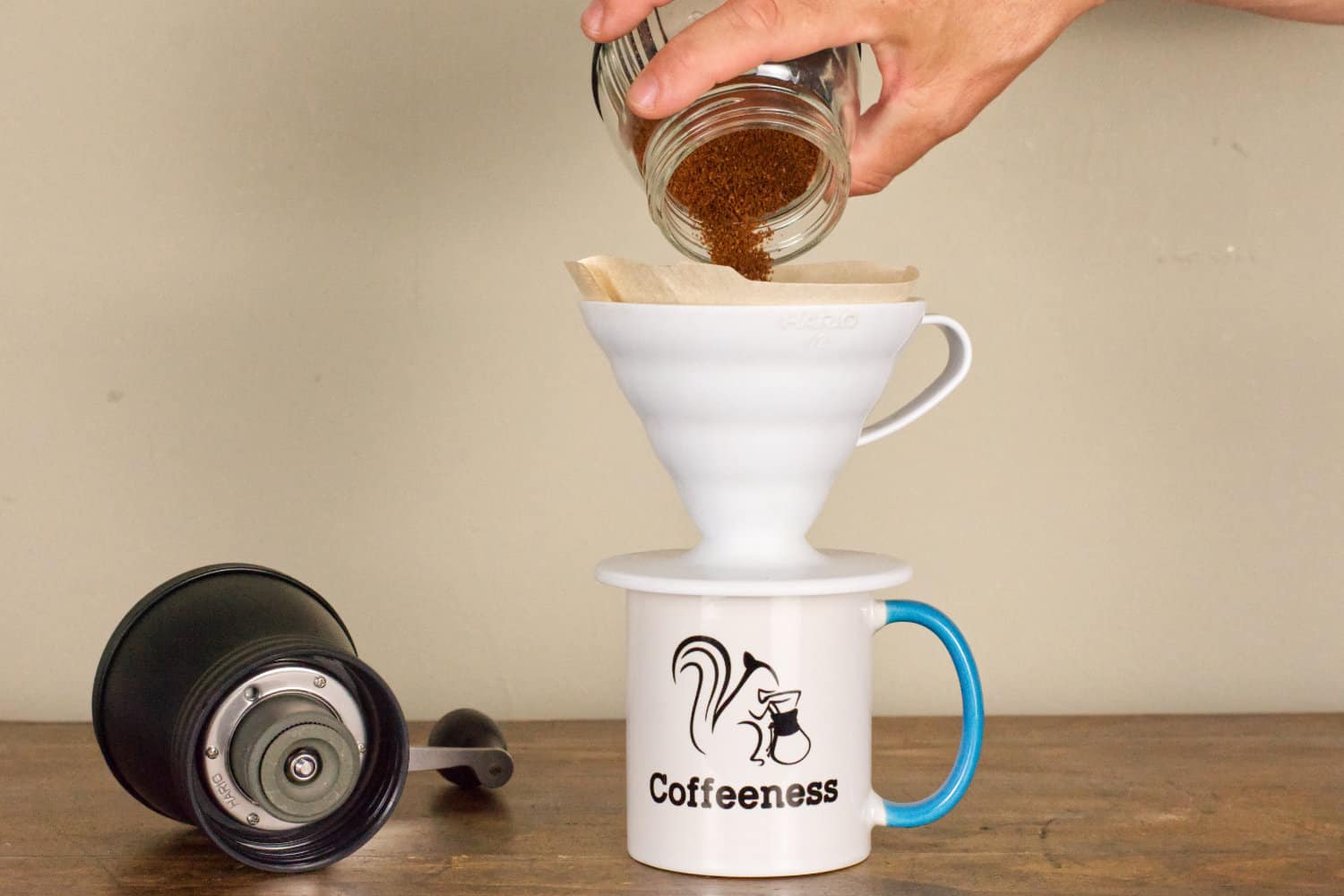 Hario Skerton Plus Coffee Grinds in Use