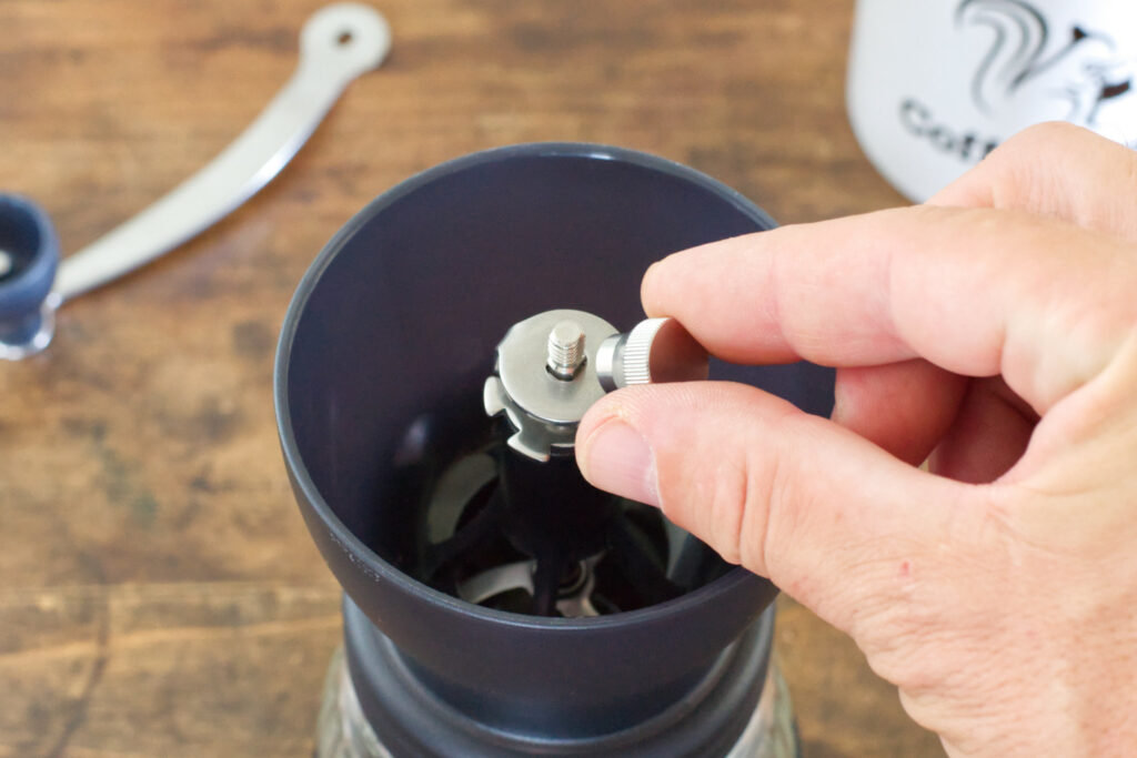 Adjusting the grind on the Hario Skerton Plus.